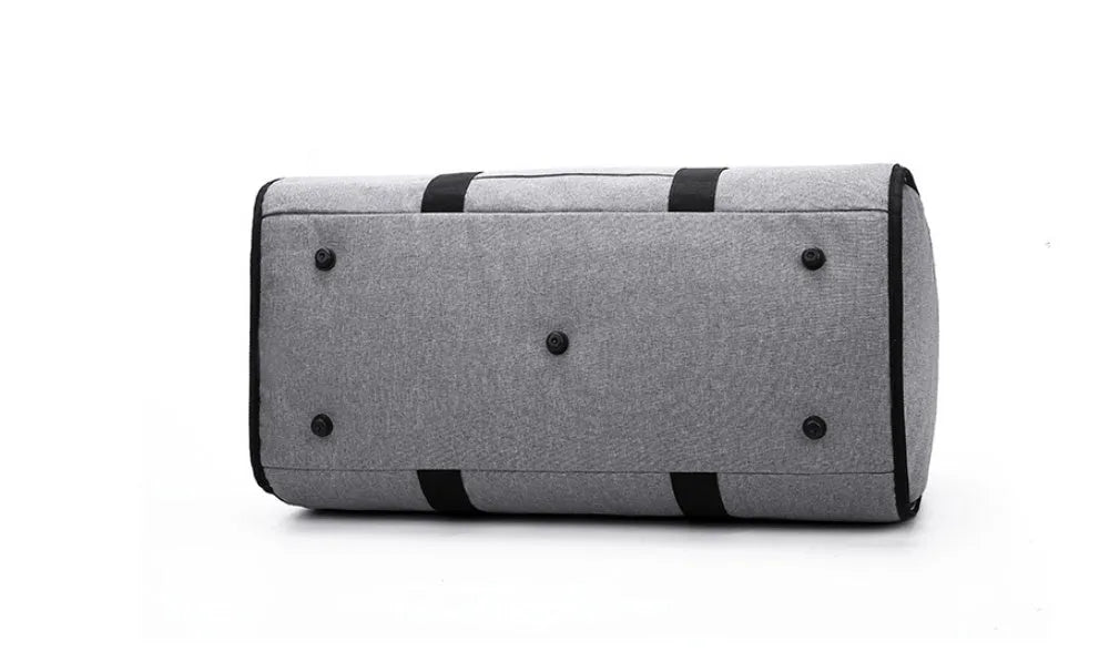 Cylinder-shaped travel bag in Oxford cloth with a zipper opening, shown in one of four colour options.