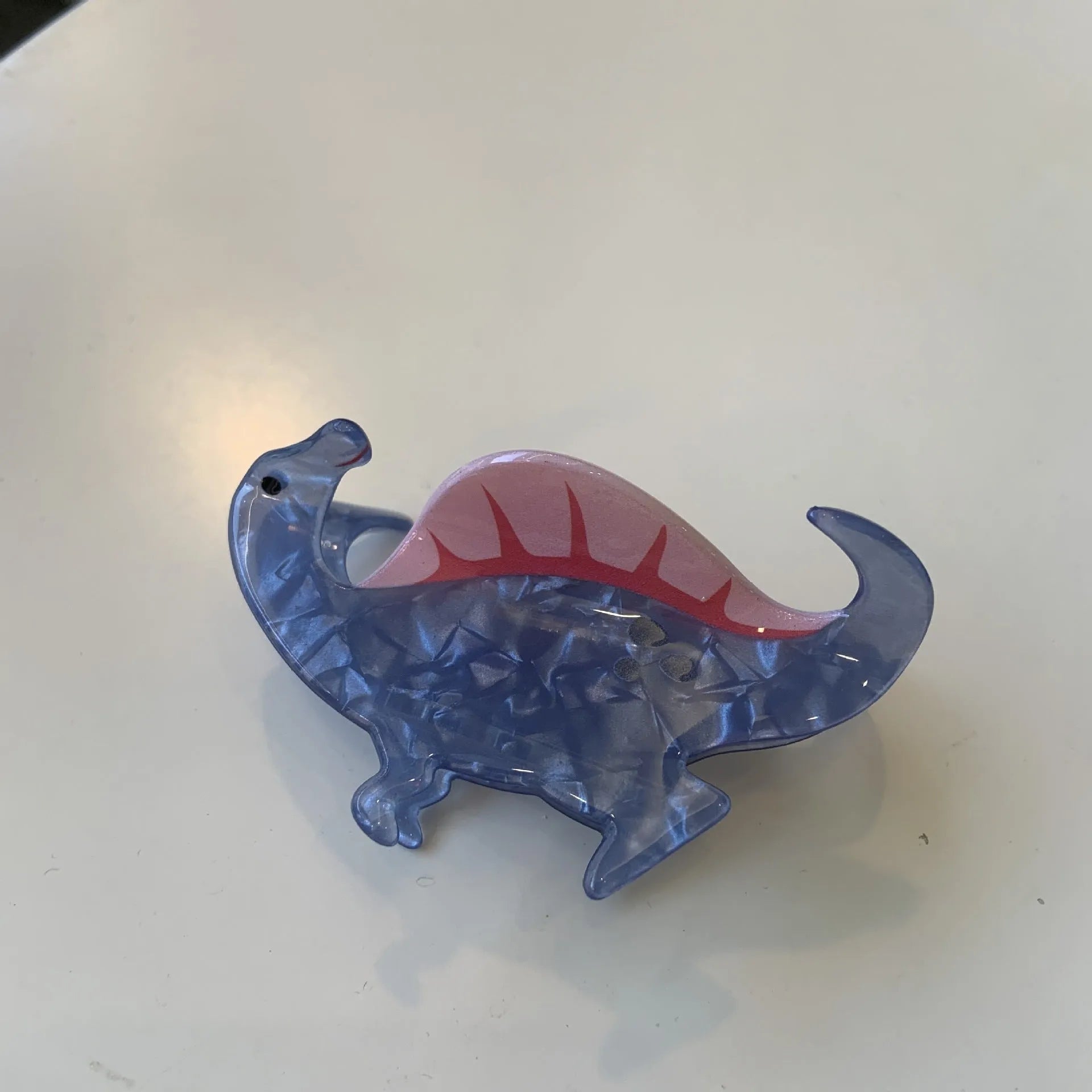Acrylic dinosaur hair clip with jaw grip closure in one of six colourful designs