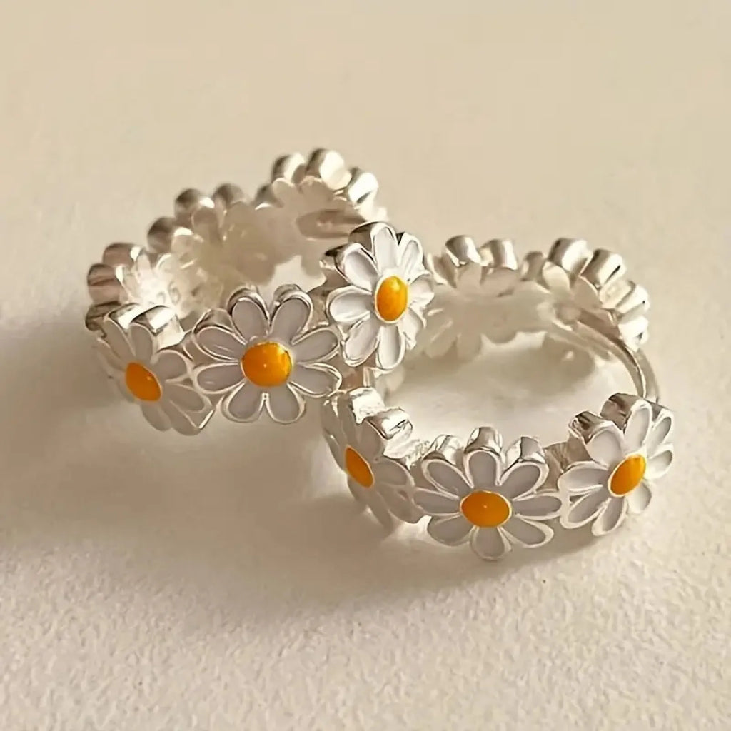 White daisy flower ring earrings with a platinum gemstone inlay on electroplated copper.