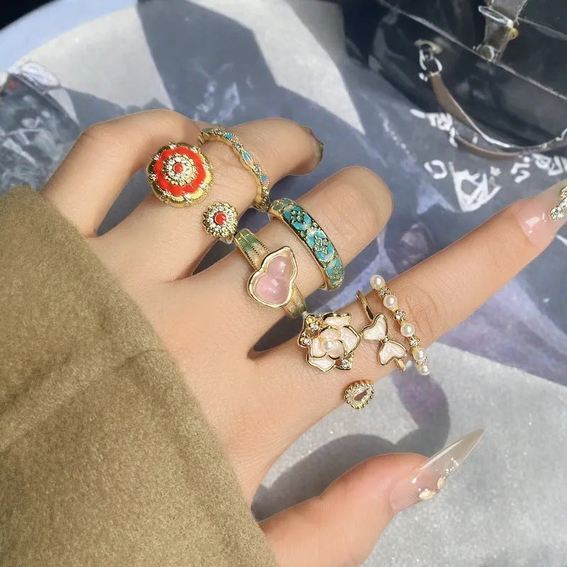 Adjustable vintage-style copper ring with a gourd shape, floral design, and zircon stones.