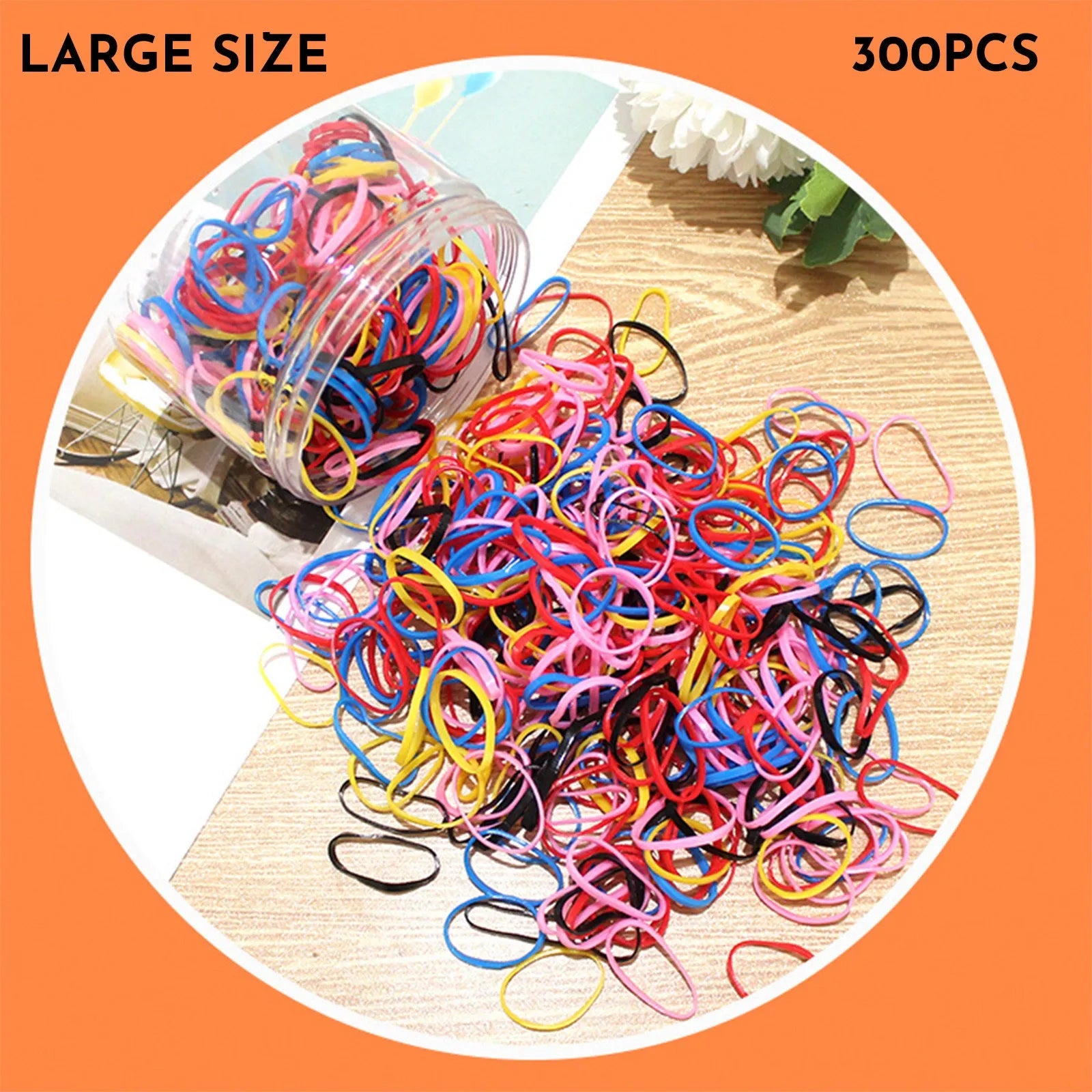 Multi-colour TPU baby hair ties in a reusable plastic storage container.