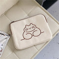 Nylon protective sleeve for tablet with embroidered fat cat design and zipper closure.
