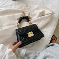 Korean style small square shoulder bag in purple with crossbody strap and structured design