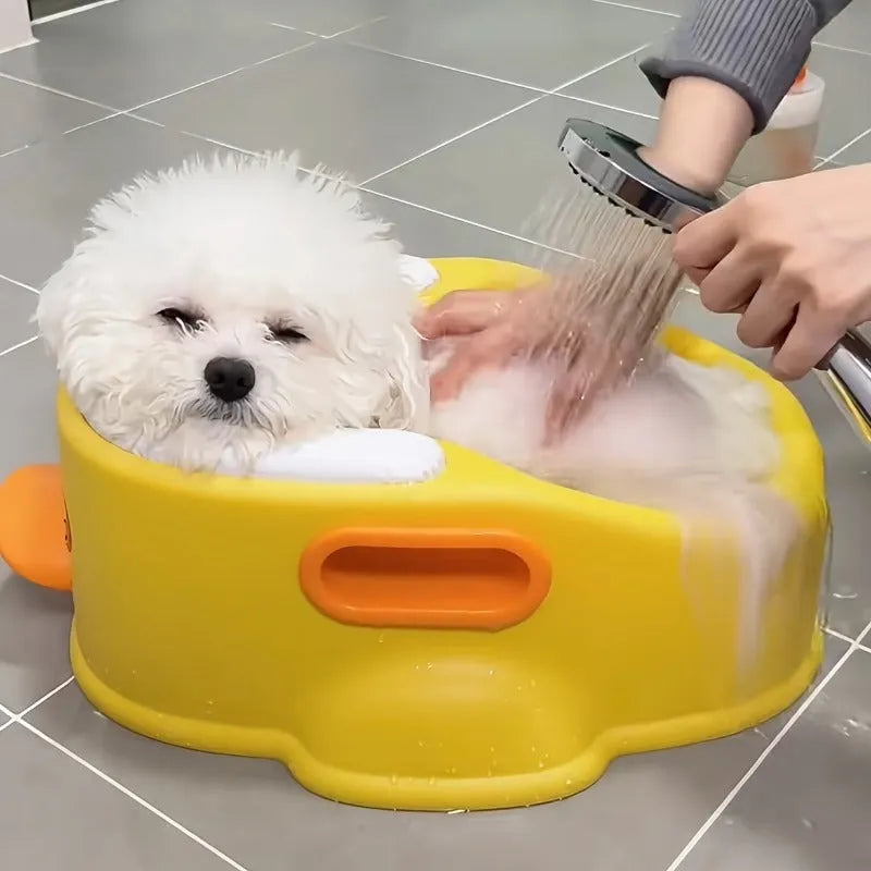 Blue PVC bathtub shaped like a duck for washing small to medium dogs and cats.