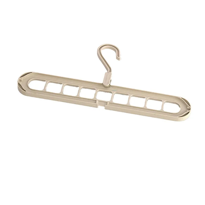 Plastic multifunctional hanger with nine holes for trousers in beige, blue, grey, green, or pink colours