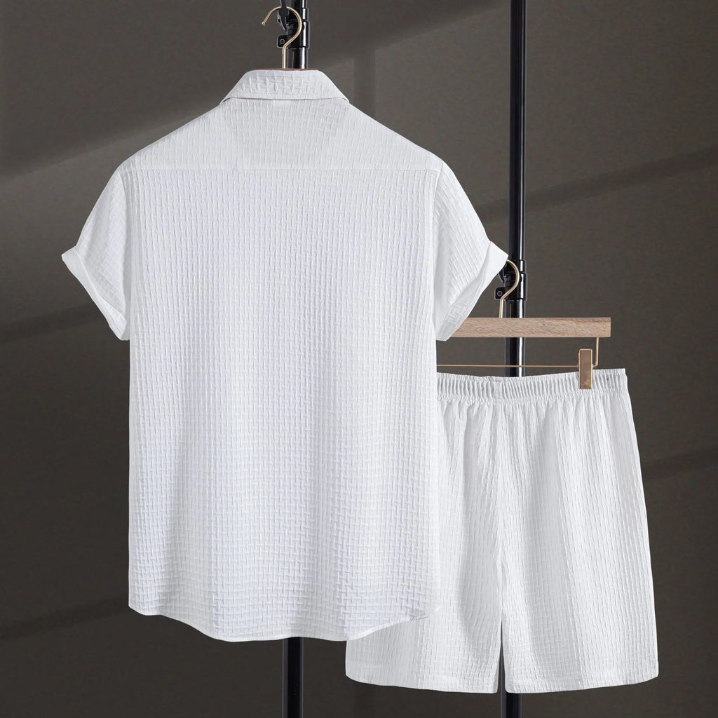 Men's loose cotton blend beach suit with short sleeve cardigan shirt and shorts in black.