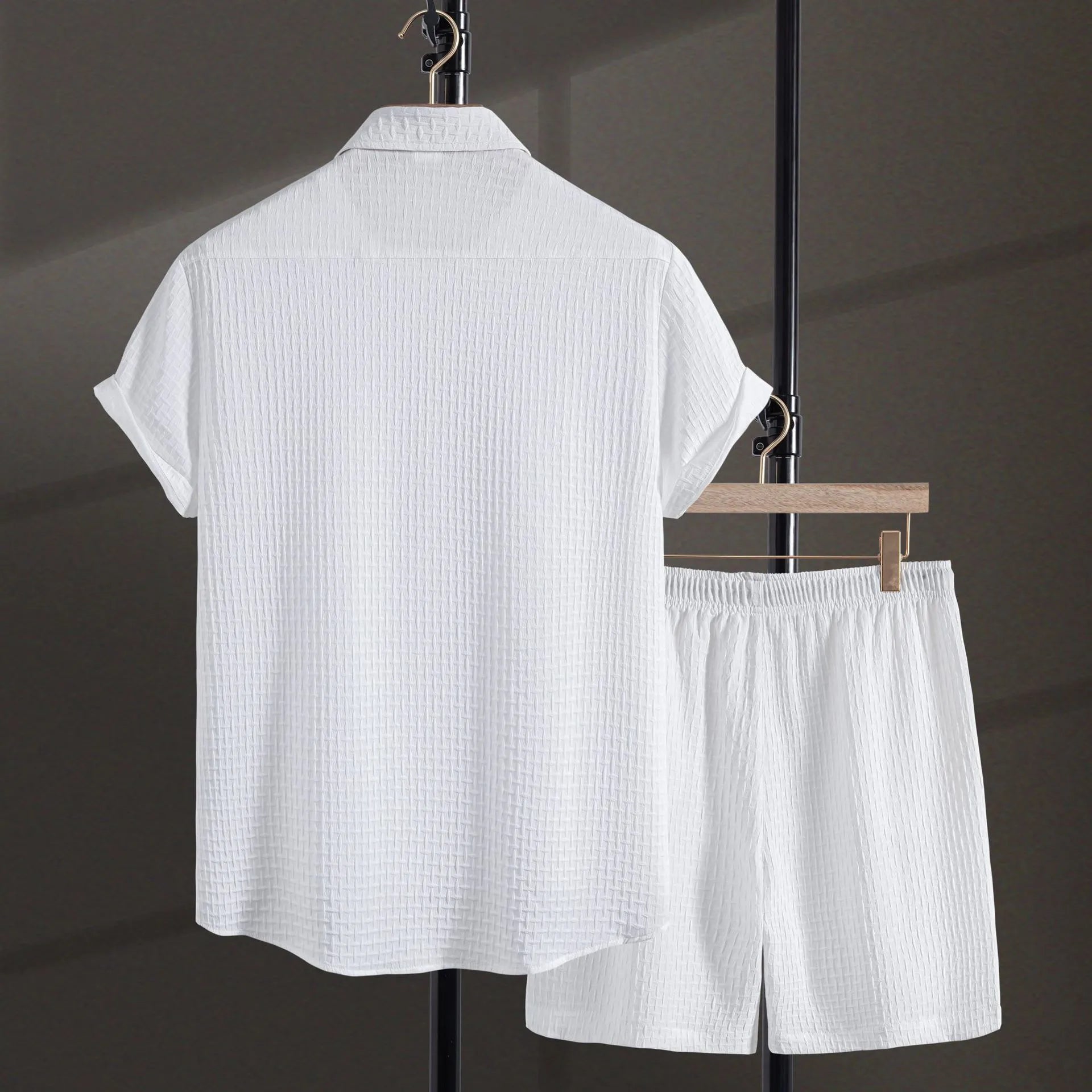 Men's loose cotton blend beach suit with short sleeve cardigan shirt and shorts in black.