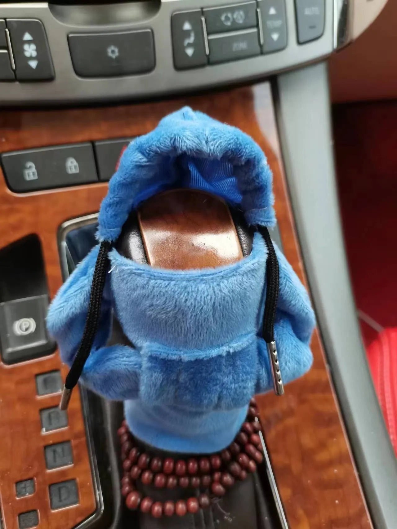 Dutch velvet car gear handle sleeve in multiple colour options on a car gear stick