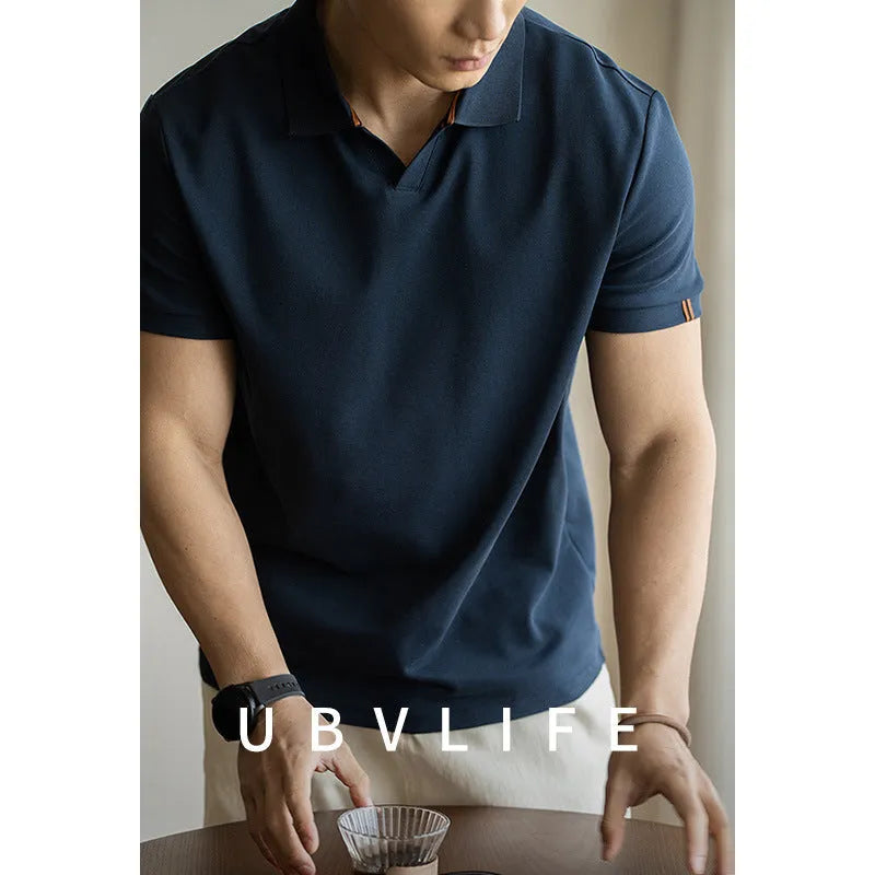 Cotton polyester blend polo shirt in blue colour showing short sleeves and regular cut design