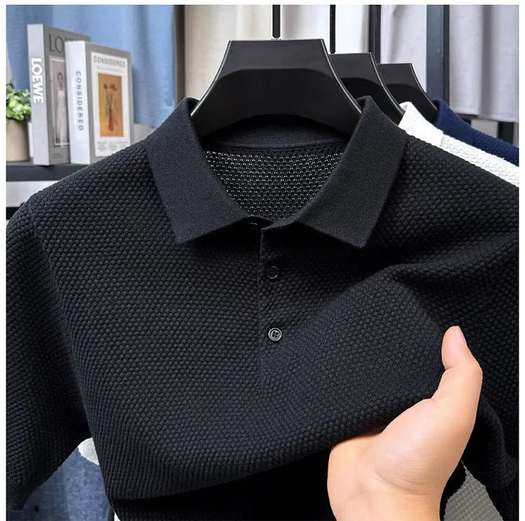 Men's loose fit short sleeve cotton pullover sweater in grey, shown on a model.