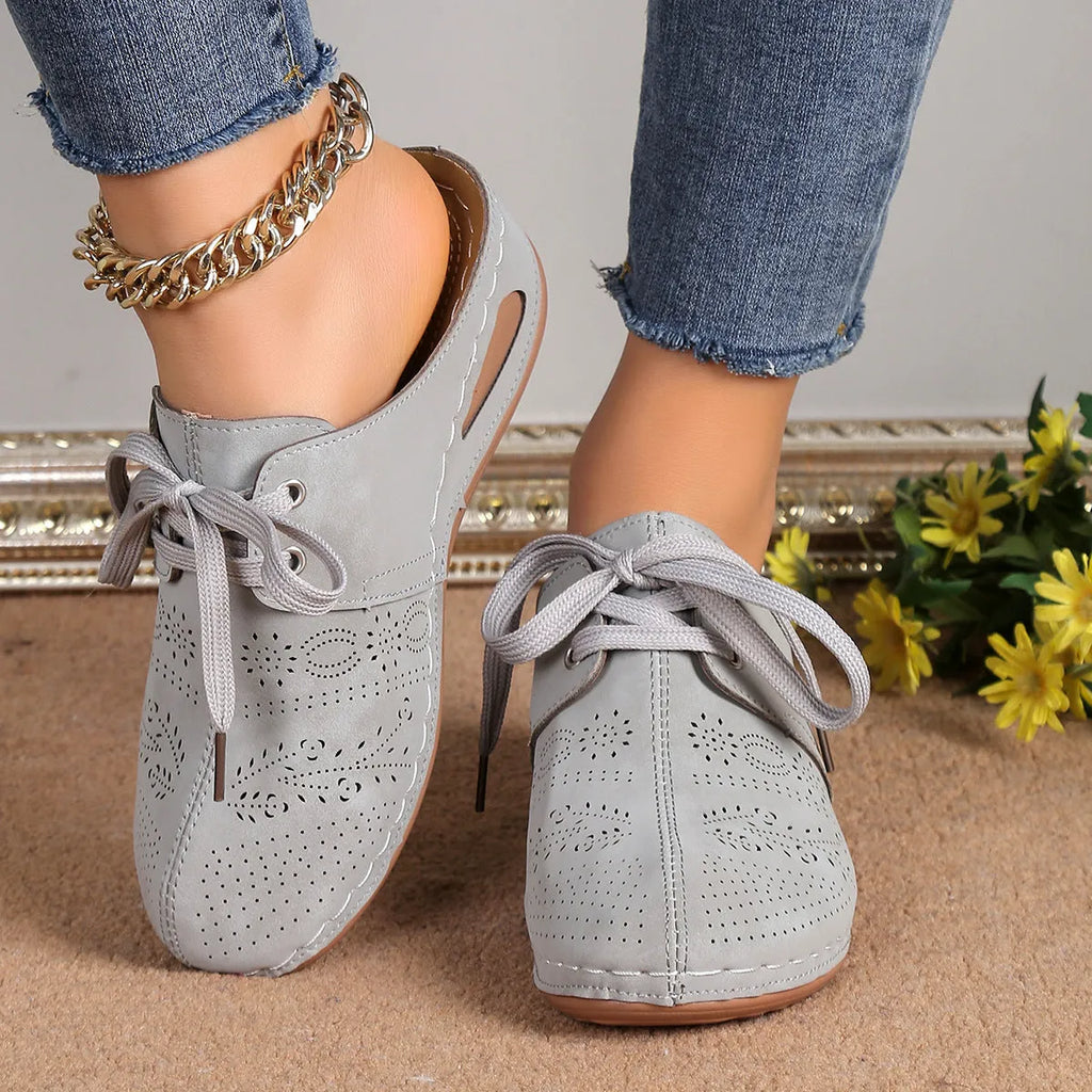 Women's summer wedge slippers with suede upper, lace-up design, and rubber sole in light grey.