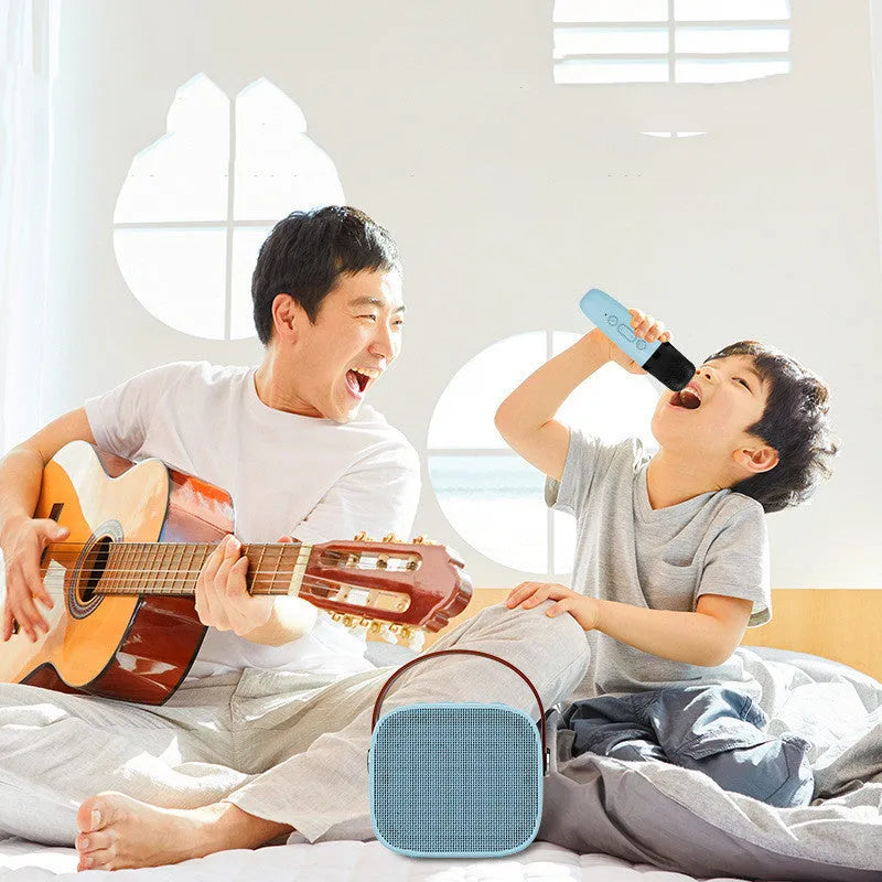 Compact portable Bluetooth speaker with microphone in white, pink, or blue colour options