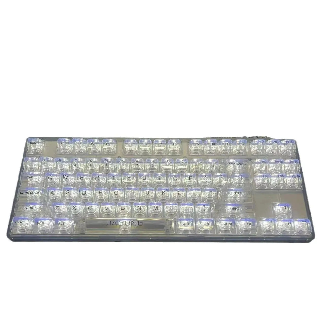 132 transparent plastic key caps arranged for a full-size keyboard layout