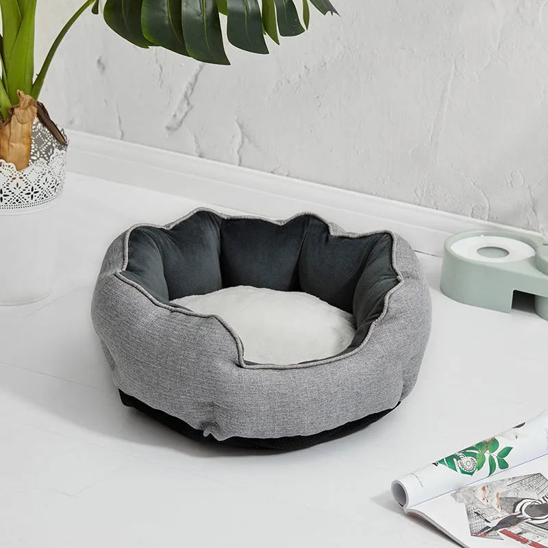 Blue octagonal pet bed with removable mat for a small dog or cat.