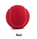 Bright pink durable rubber dog tennis ball with bite-resistant design for aggressive chewers.
