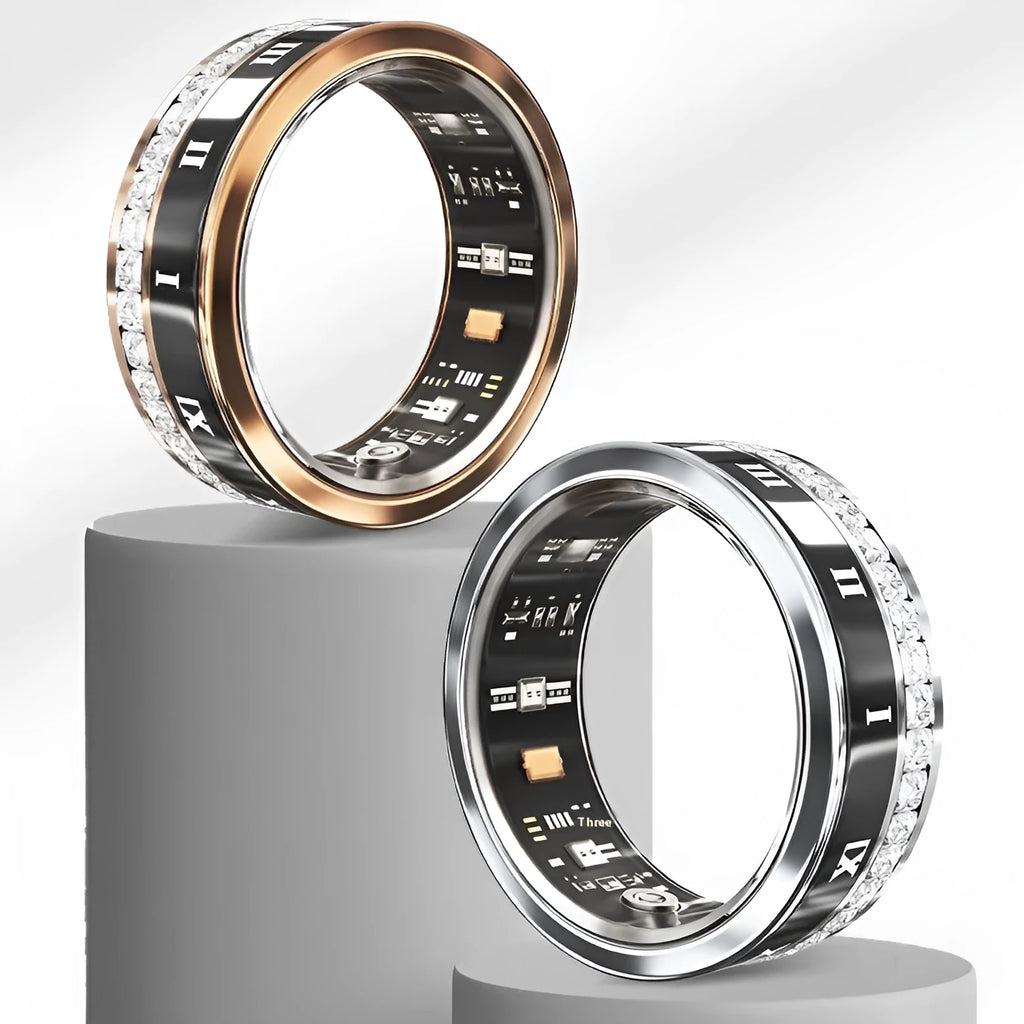 Gold and silver smart rings with diamond inlay for blood oxygen monitoring on a finger.