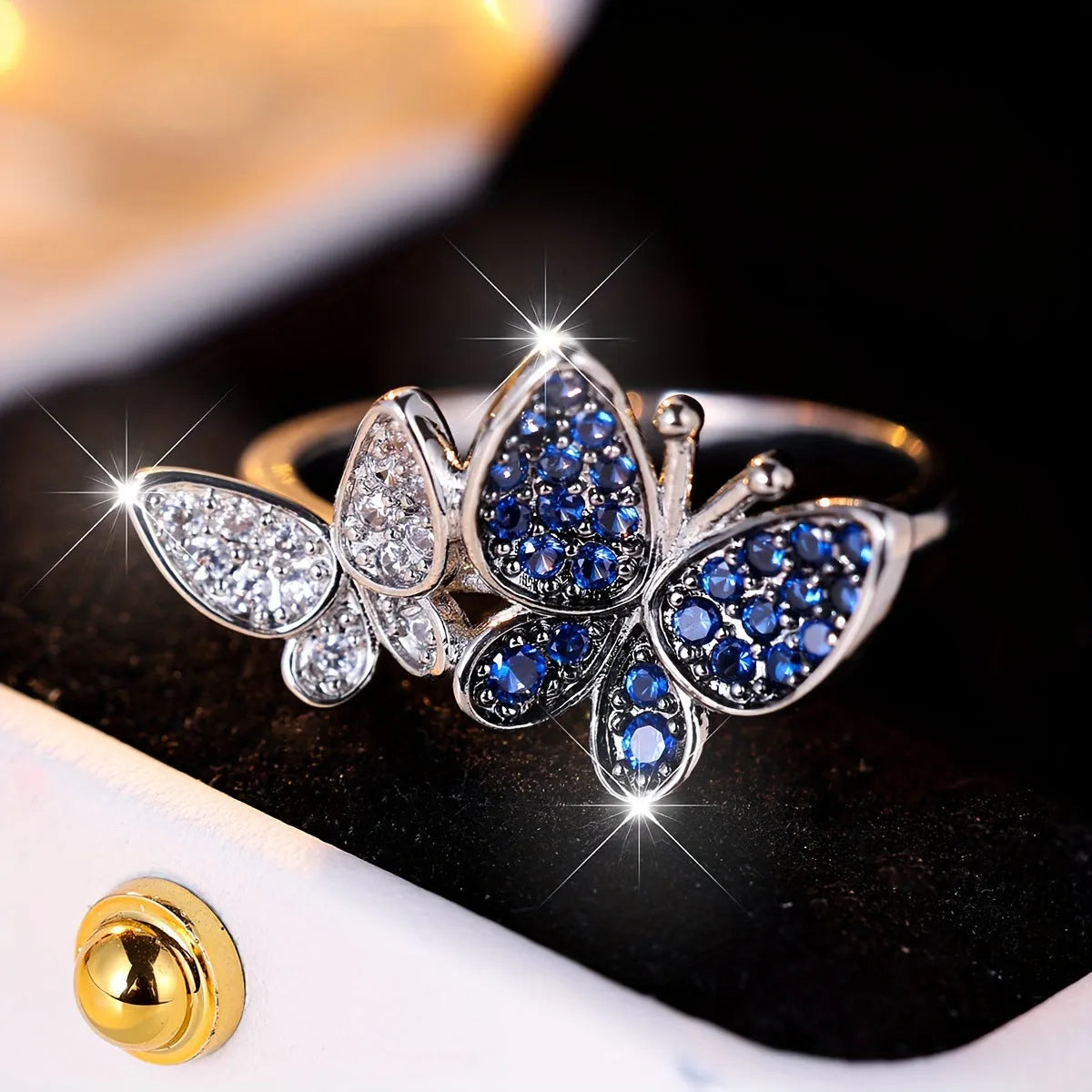 Blue and white butterfly ring TJZ40135 made from copper with electroplated finish, ring size No 8