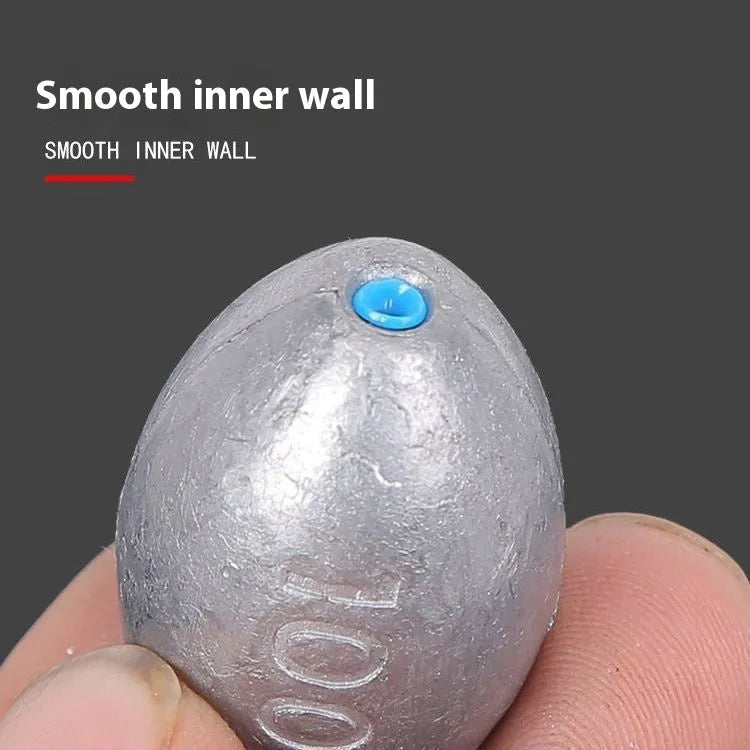 Rugby-shaped olive lead fishing weight with plastic core for sea fishing in various sizes