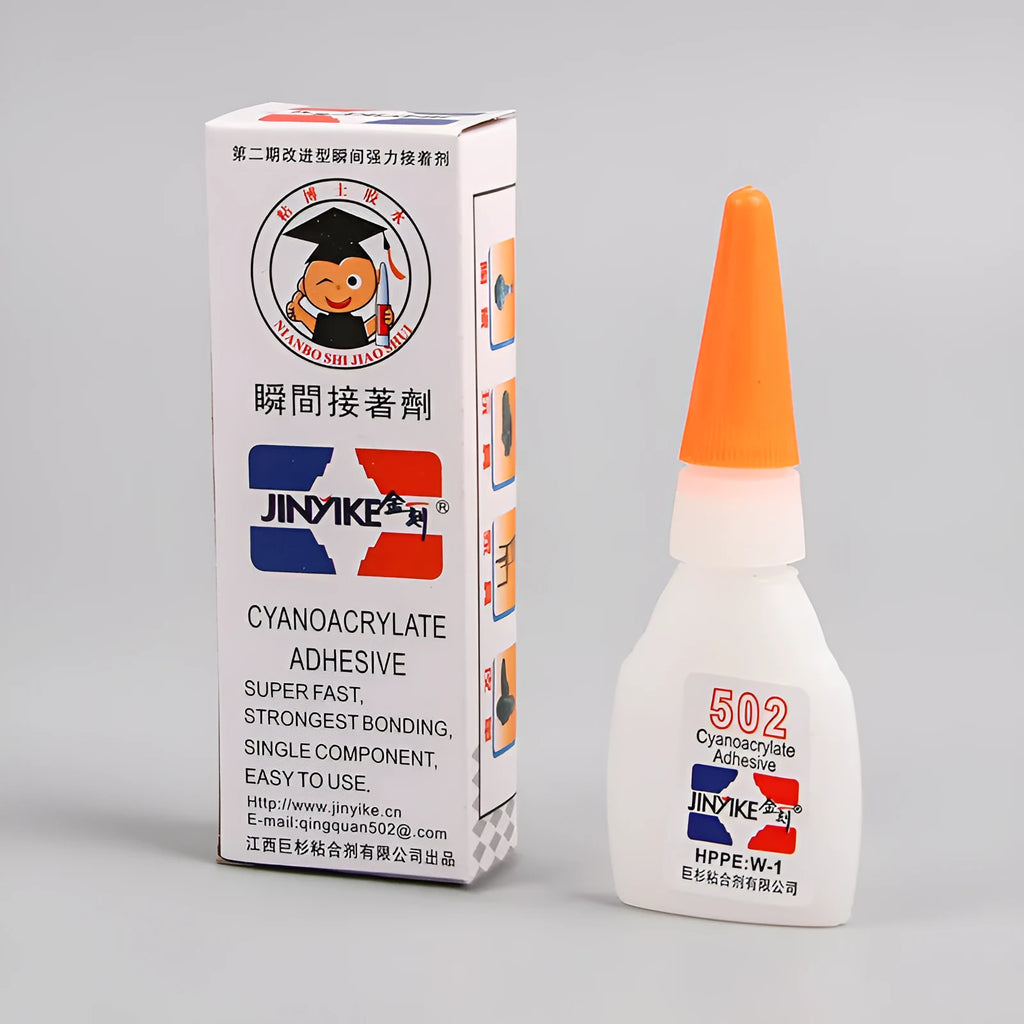 Tube of specialised shoe repair glue for strong, permanent adhesive patches on footwear.