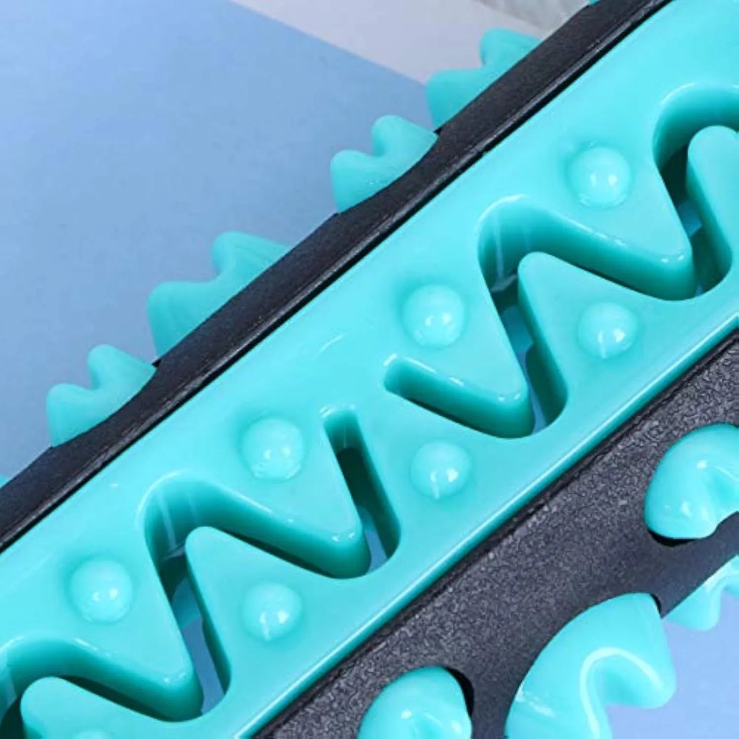 Natural rubber dog dental chew toy with ridges, 15cm long, in blue, green, yellow or black blue