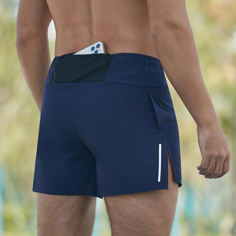 Men's loose fit off-road running shorts in black, shown for marathon and cross-country running