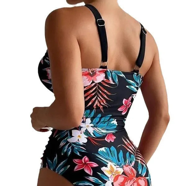 Women's floral print backless one-piece swimsuit on a hanger