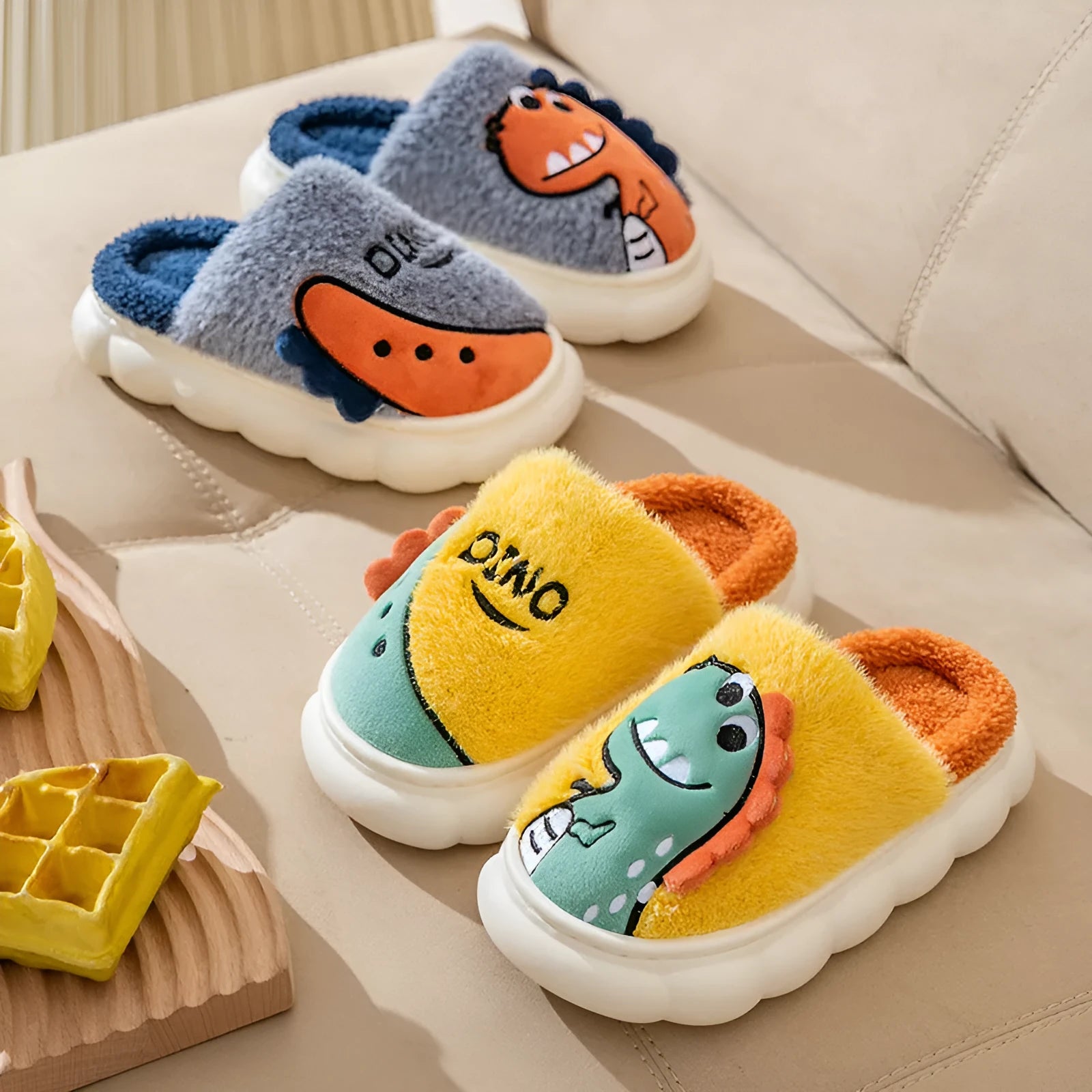 Cotton plush indoor slippers with dinosaur designs in grey, coffee and orange colours