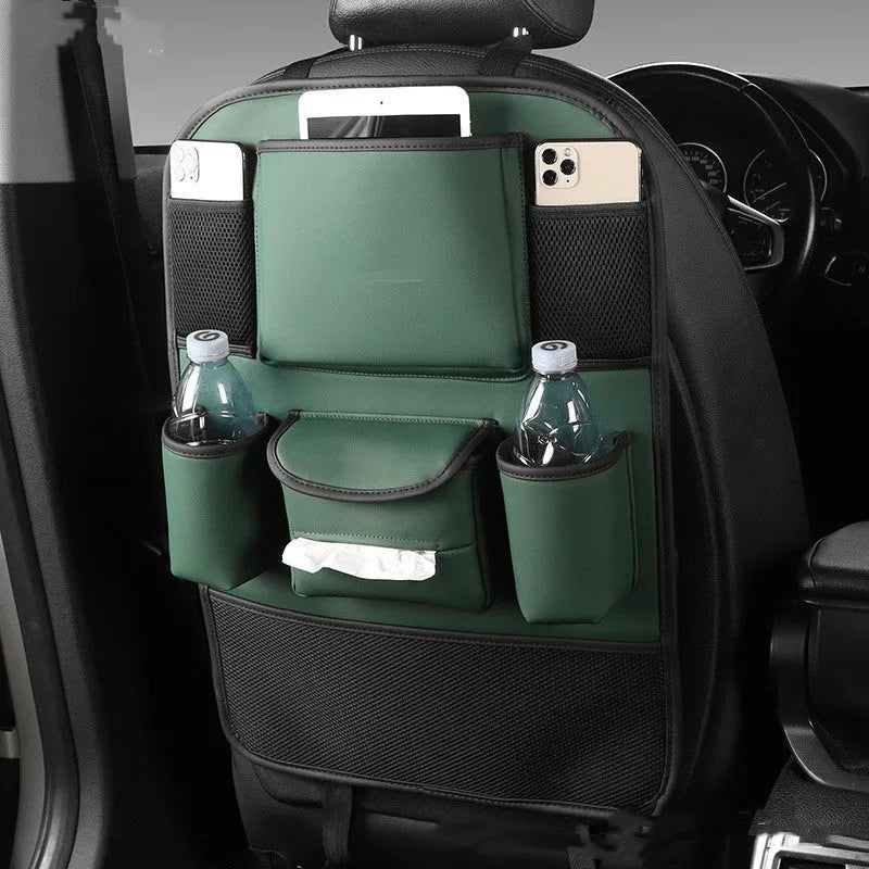 Black leather car seat back storage bag hanging on a vehicle seat.