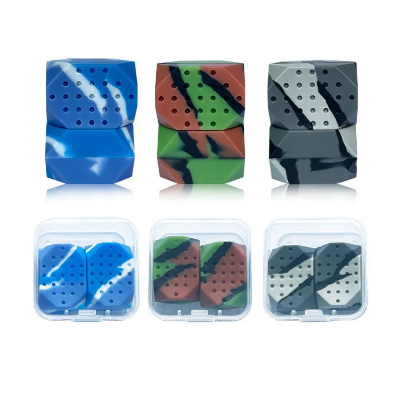 Transparent box containing two camouflage silicone facial muscle fitness balls for jaw exercise