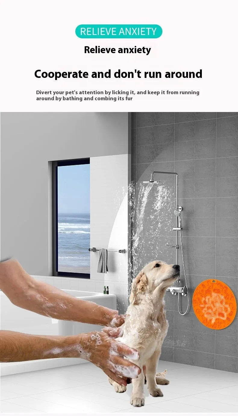 Round blue silicone pet licking mat with a central white suction cup on a kitchen tile.