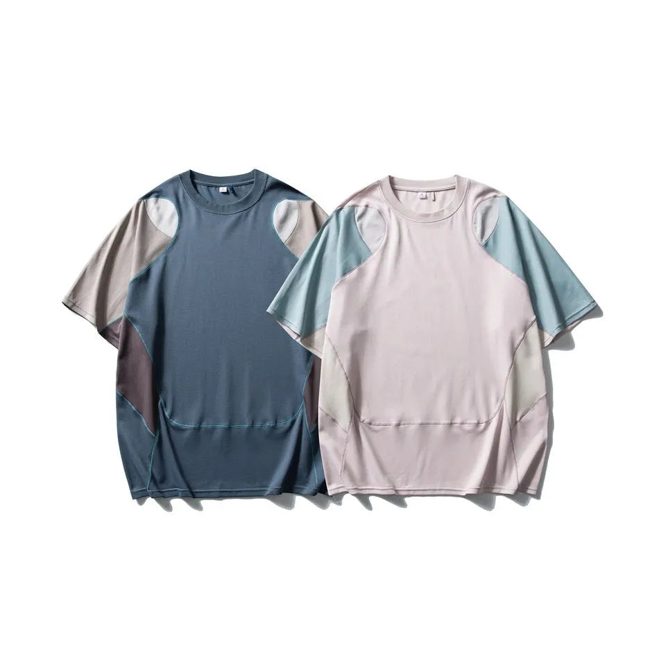 Men's loose patchwork contrast colour cotton blend sports T-shirt with short raglan sleeves.