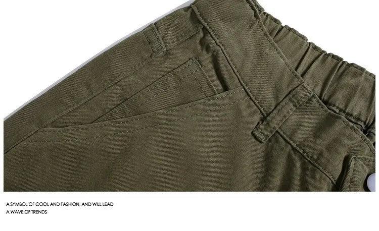 Women's workwear cropped pants with wide-leg cut in apricot colour showing mid-waist and micro-elastic waistband