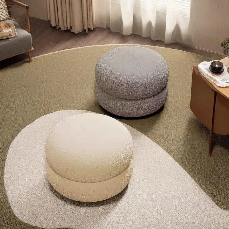 Small cream style round stool with skin-friendly lamb high elastic sponge fill in a living room