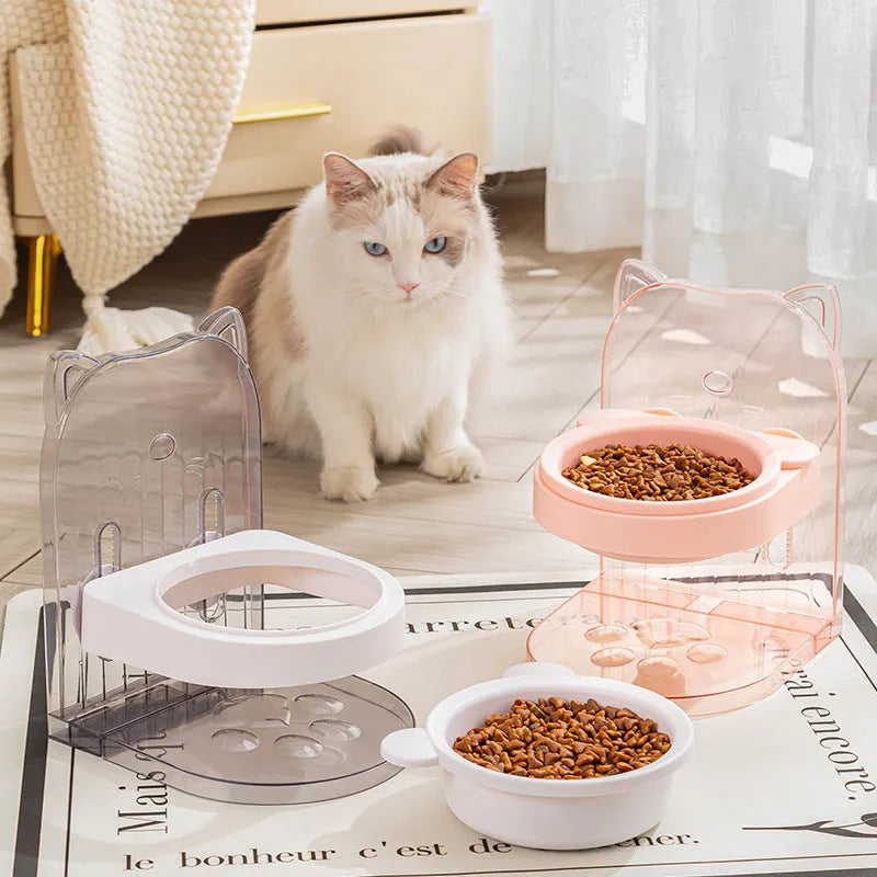 Grey and pink cat feeding bowls with anti-spill design, adjustable height, and removable hanging cage