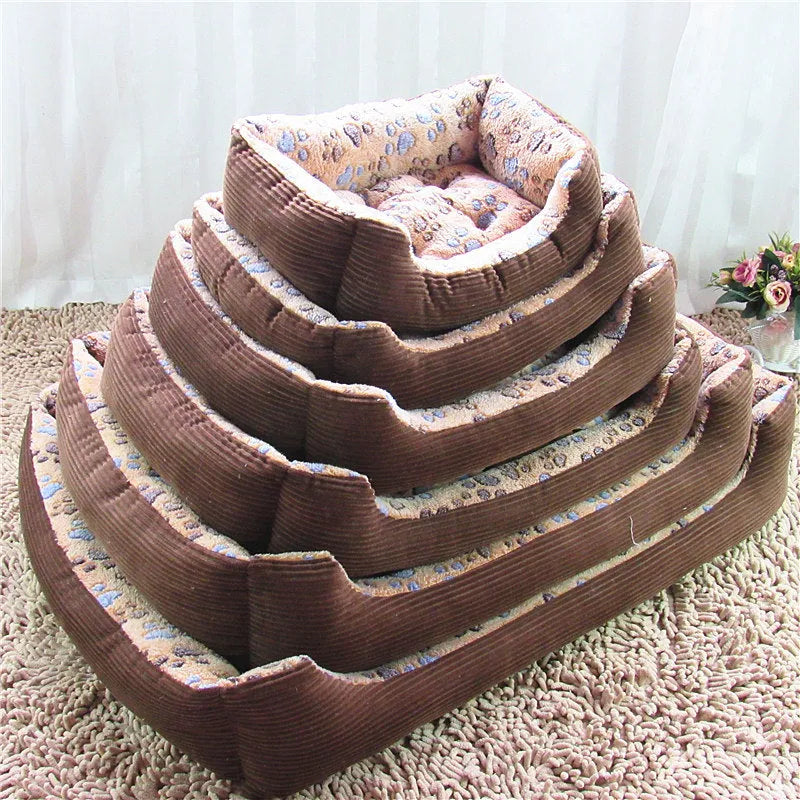 Beige plush bolster dog bed for small dogs on a wooden floor, showing non-slip bottom and raised sides.