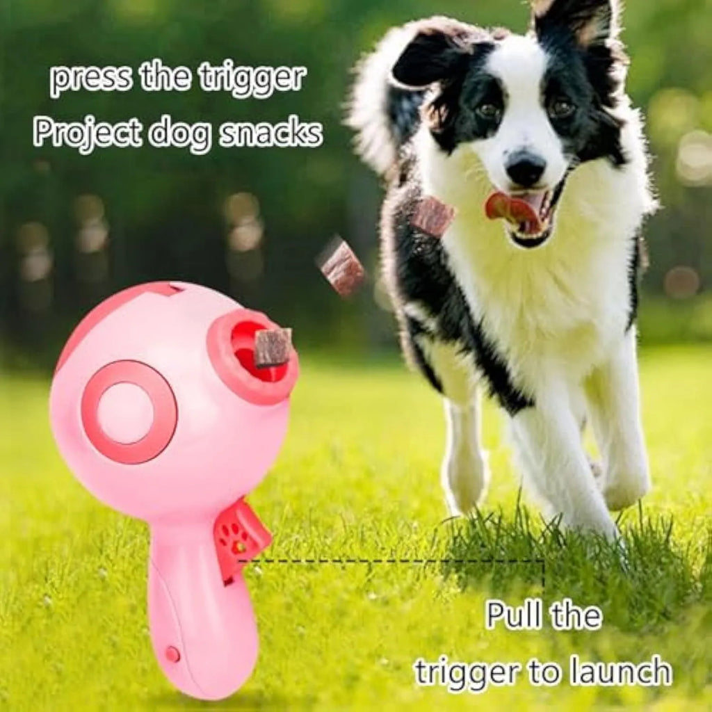 Green dog treat launcher toy measuring 15.5 × 9 × 8.5 cm for interactive play and remote feeding