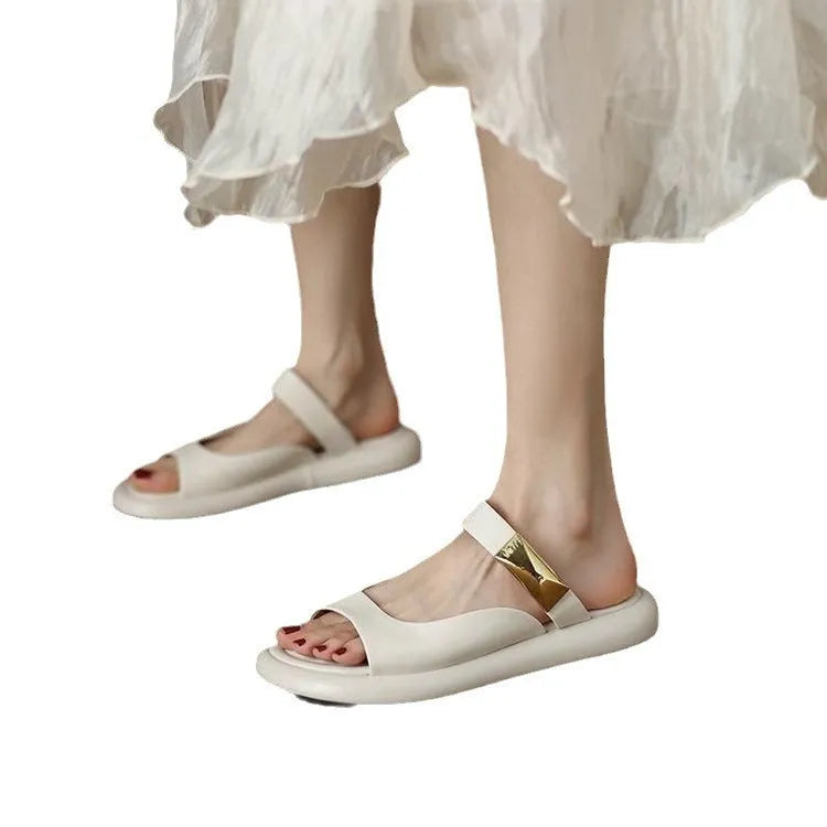 Women's apricot peep toe flat platform sandals with a rubber sole on a white background.