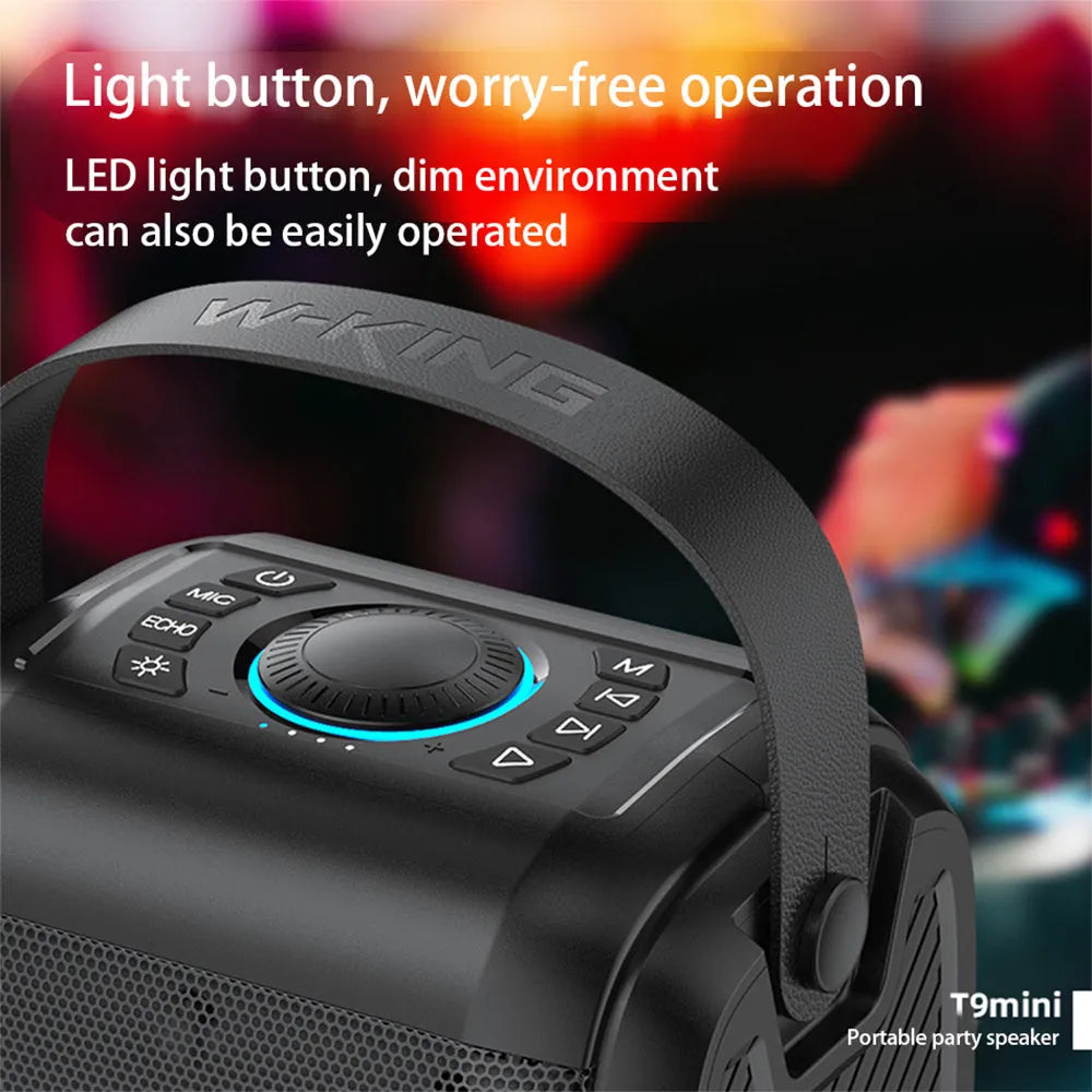 Black Bluetooth speaker with cool light circle in horizontal position on table