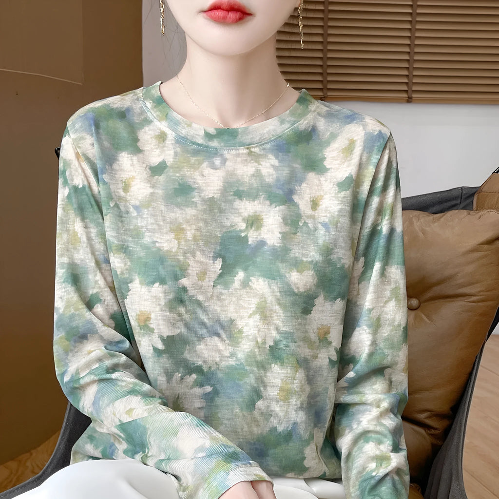 Floral print round neck pullover shirt in Tencel cotton fabric on hanger