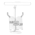 Multifunctional adjustable reading lamp on a bookshelf with charging cable