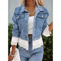 Blue women's denim jacket with lace stitching detail on the front, with long sleeves.
