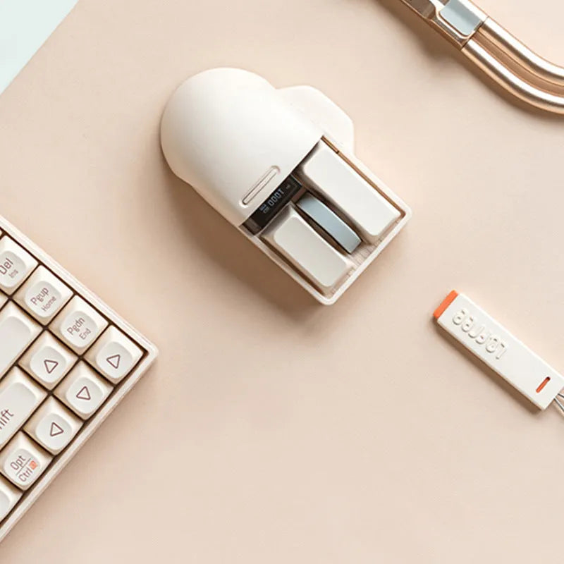 Xiaoqiao tofu colour wireless ergonomic mouse with USB receiver on a desk