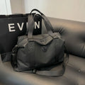 Large black travel rucksack made from Oxford cloth with breathable back padding and multiple compartments.