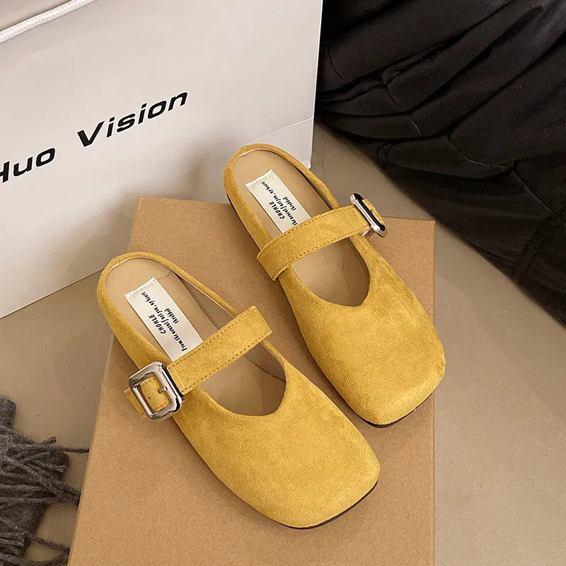 Women's flat square head slippers in apricot colour, showing closed toe and rubber sole.