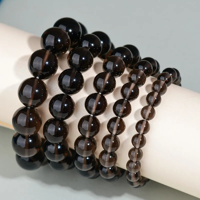 Hand-woven obsidian crystal bracelet with round beads in ethnic style unisex design