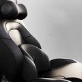 Car electric massage cushion in memory cotton shown as a headrest and lumbar support in grey colour
