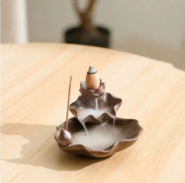 Ceramic reverse flow incense burner with purple clay, lotus and plum blossom Chinese designs