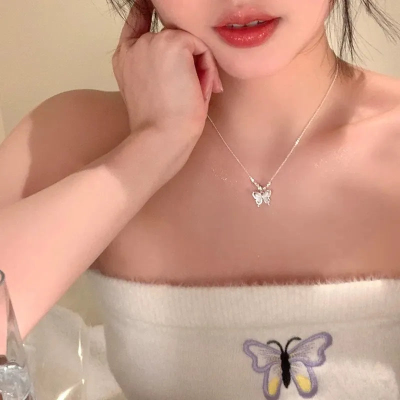 Women's square line opal butterfly necklace in silver with adjustable cross chain