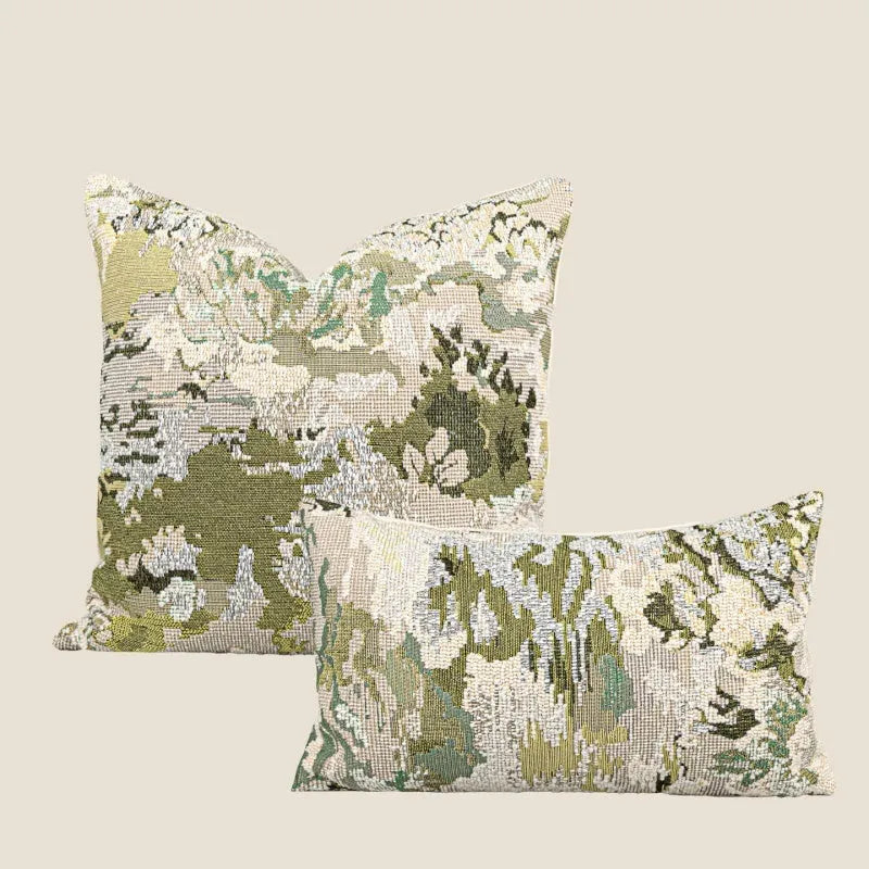 Green abstract plants and flowers pattern wool blend cushion cover on a sofa, showing square and waist pillow sizes.