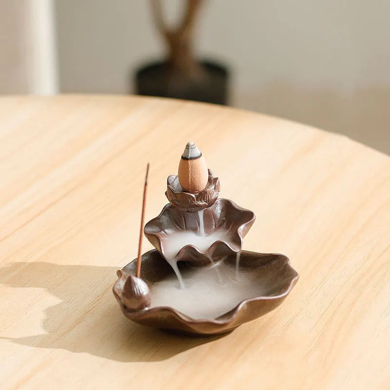 Ceramic reverse flow incense burner with purple clay, lotus and plum blossom Chinese designs